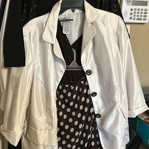 Polka dot brown skirt with brown shell and creme jacket